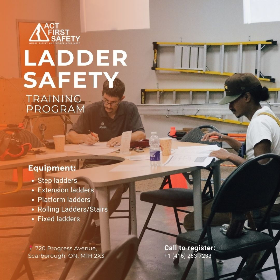 Workers attending ladder safety training with ladders displayed in a training classroom