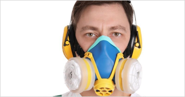 Respirator mask with cartridge filters used for workplace respiratory protection