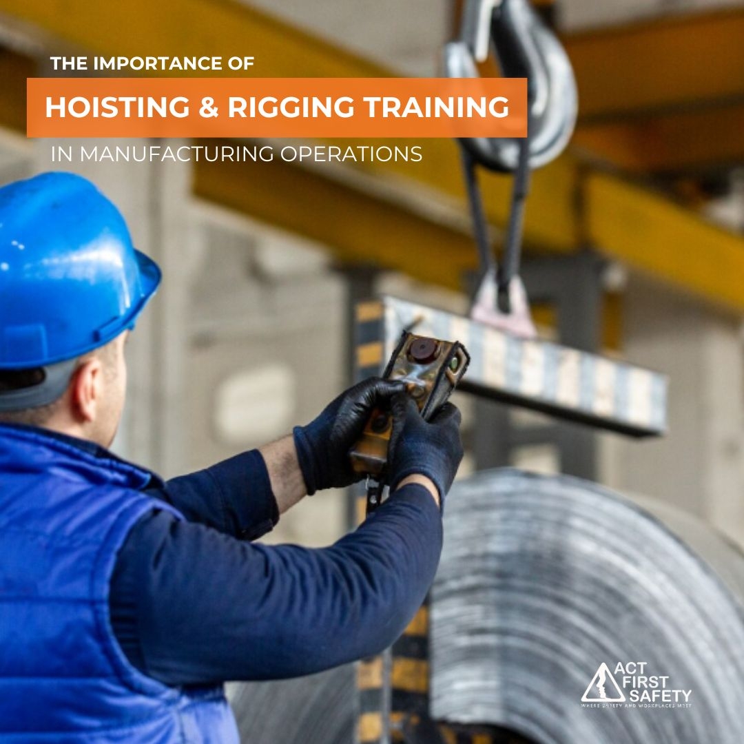 Worker operating hoist and rigging equipment for safe material lifting in manufacturing
